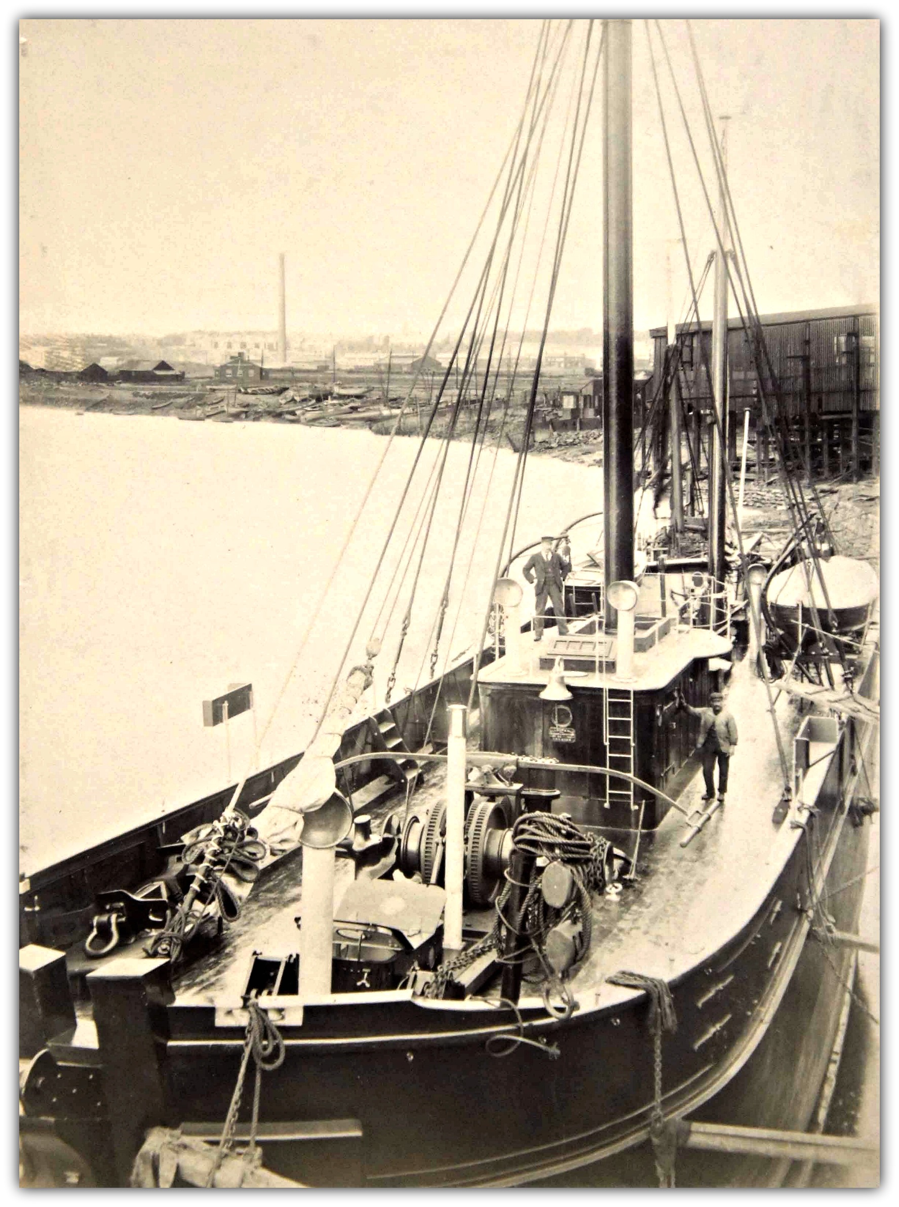 Historic photograph looking down onto the deck of a lightship